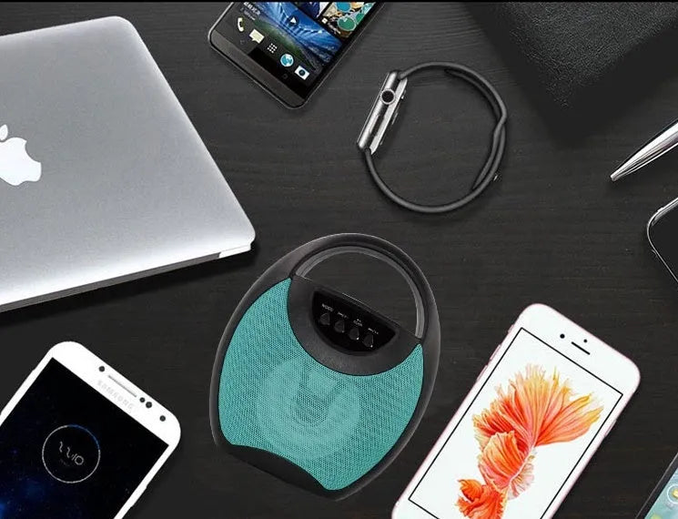 Black, blue, or pink portable Bluetooth speaker with USB port and 6-hour battery.