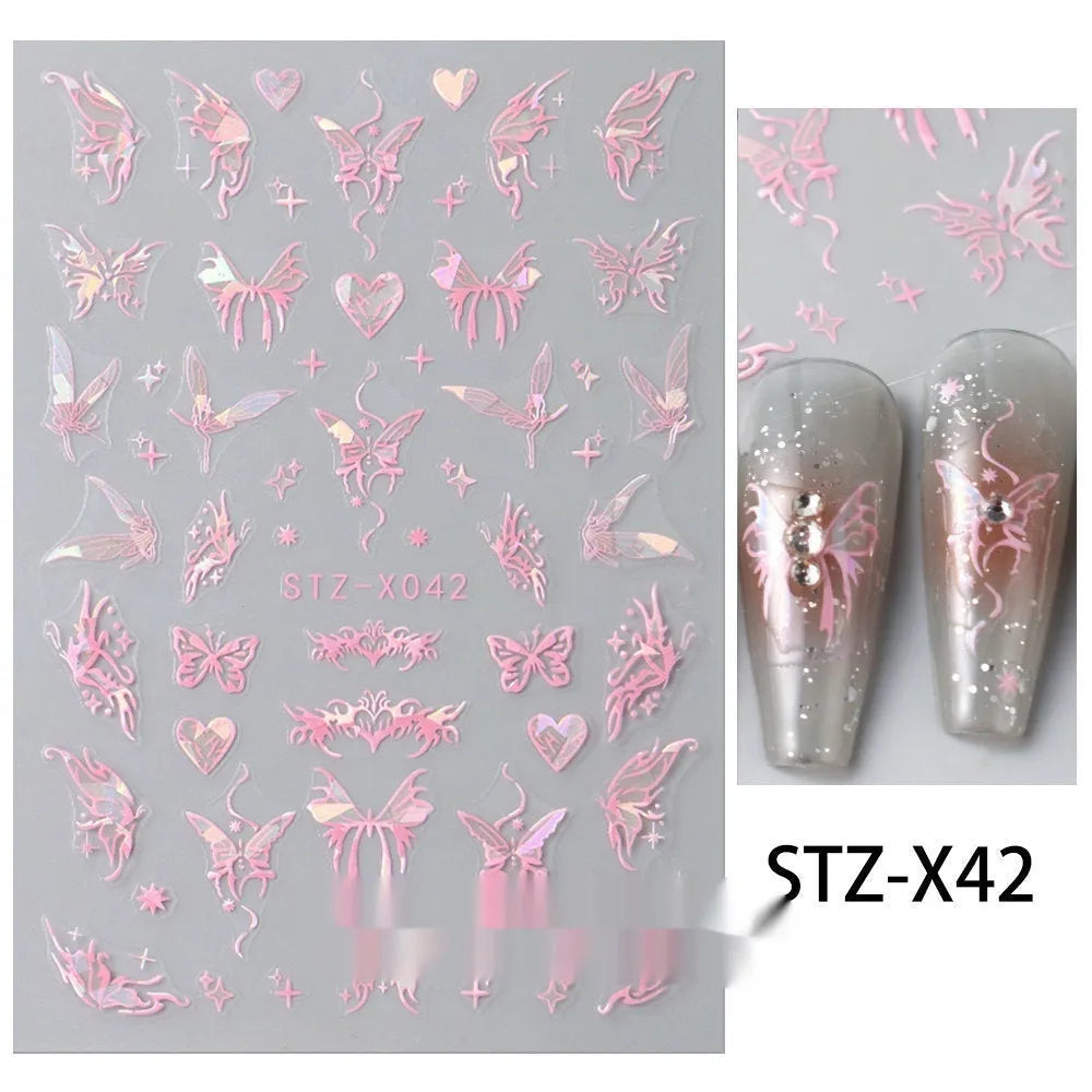 Cartoon love pattern nail art sticker decals in black and silver colours on a plastic sheet.