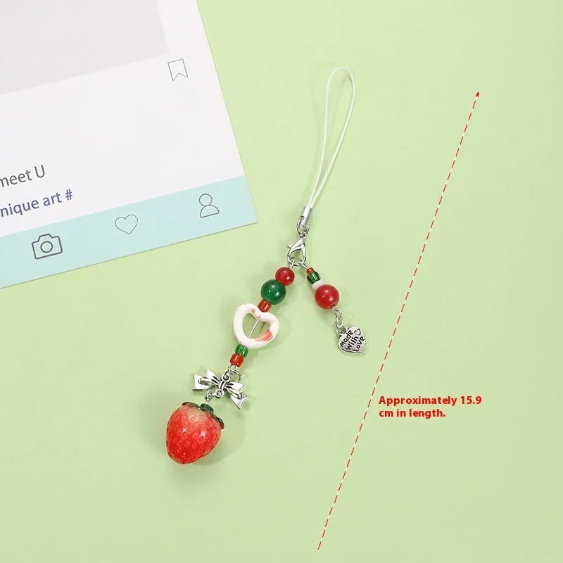 Plastic resin iPhone charm bag pendant keychain with fruit patterns including apple core and strawberry designs