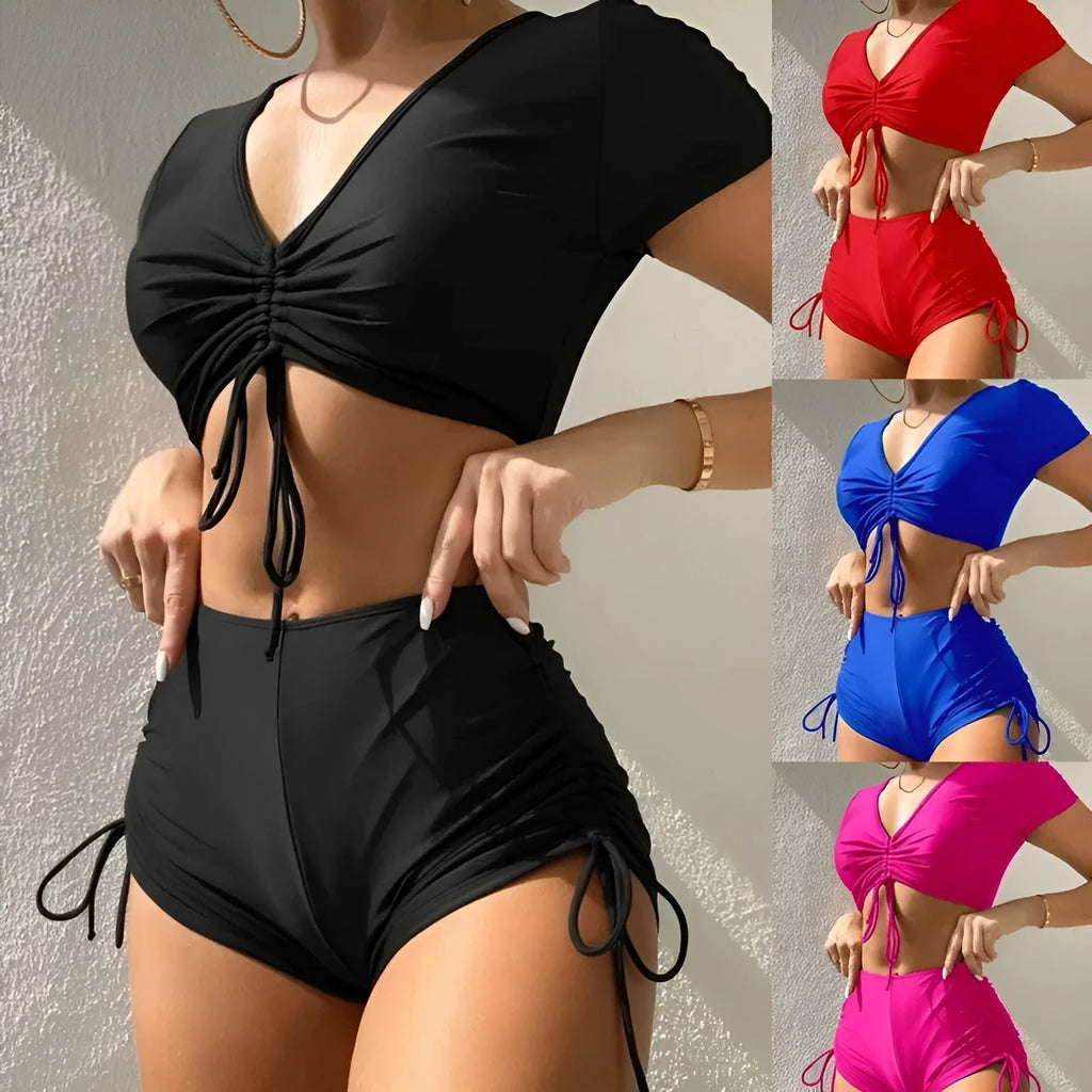 Women's lace-up swimsuit set with bow detail showing top and shorts in available colours