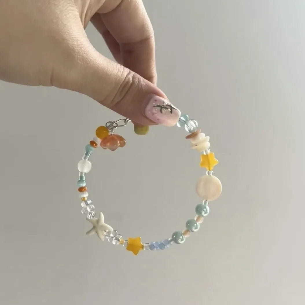 Orange seaside alloy bracelet with diamond charm and round beads for women's summer wear