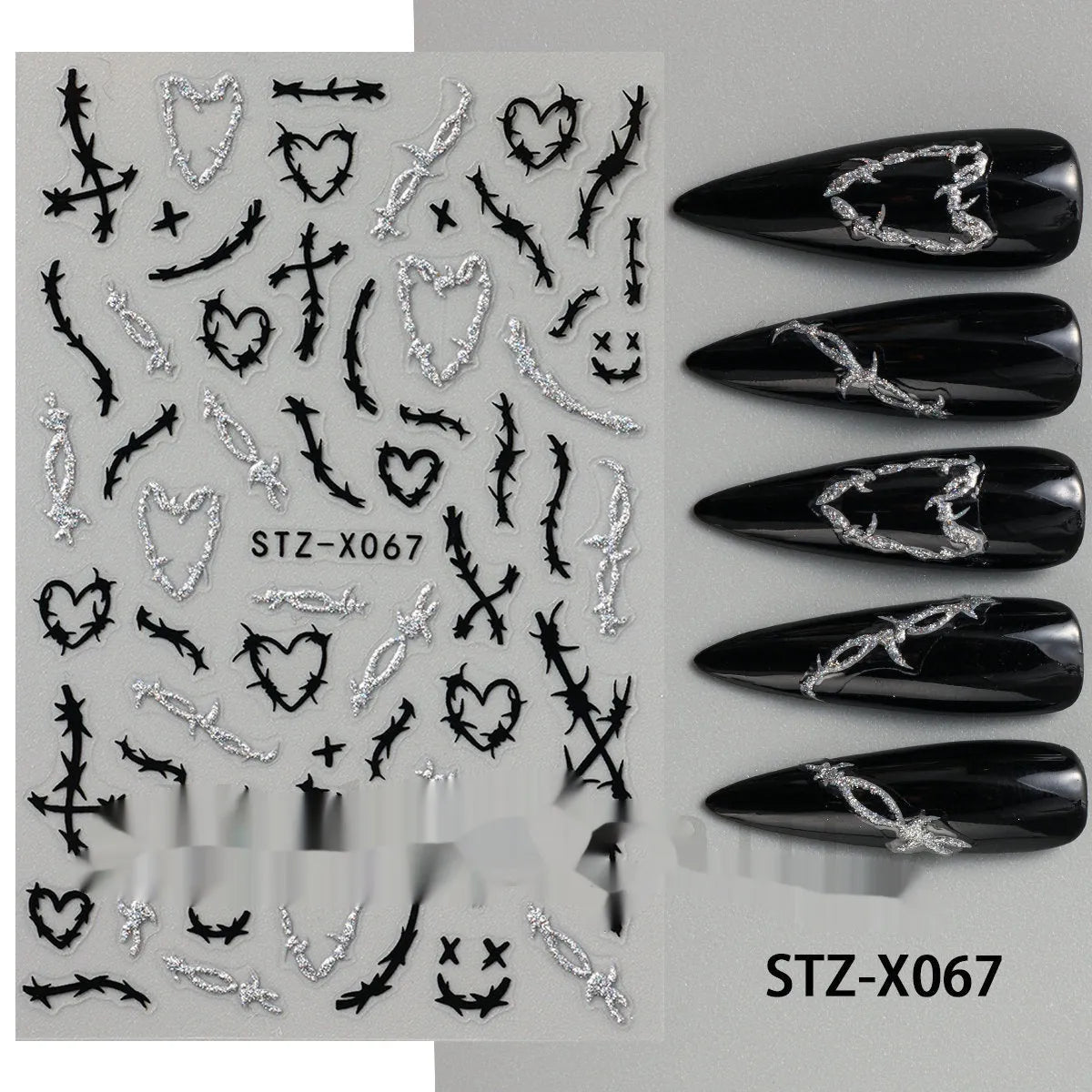 Cartoon love pattern nail art sticker decals in black and silver colours on a plastic sheet.