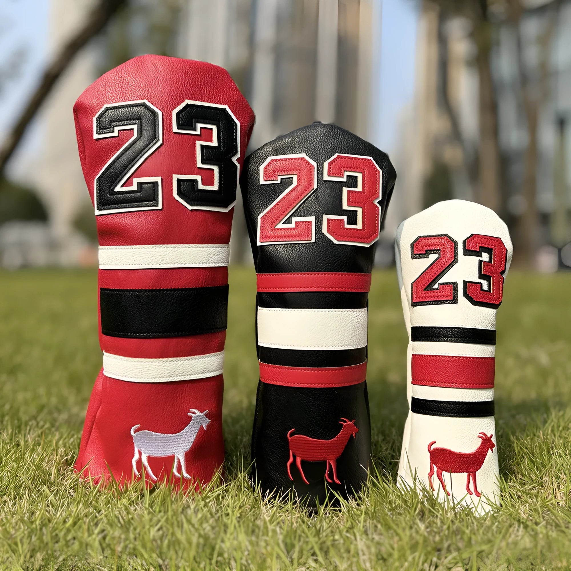 Set of four PU golf club headcovers for driver, fairway woods, hybrid, and putter in assorted colours.