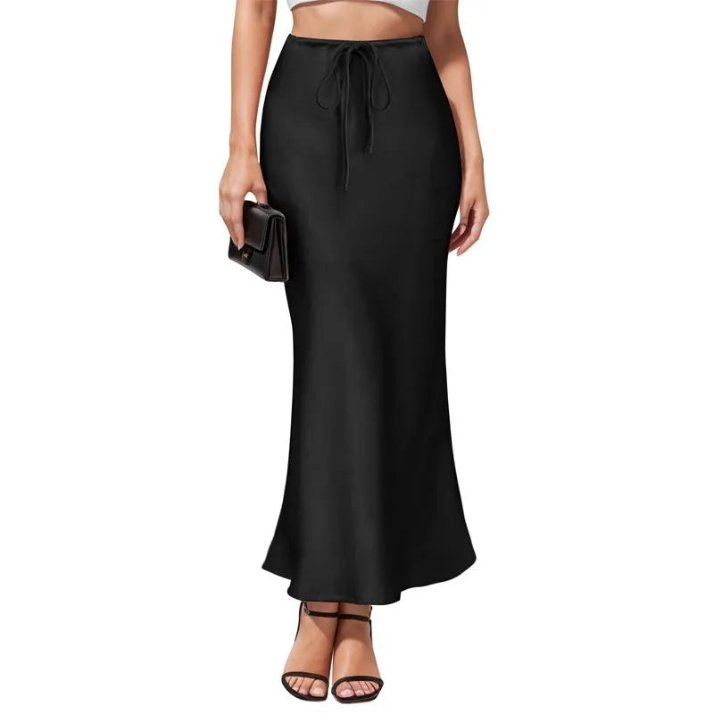 Asymmetric acetate satin skirt with irregular stitching in high waist design