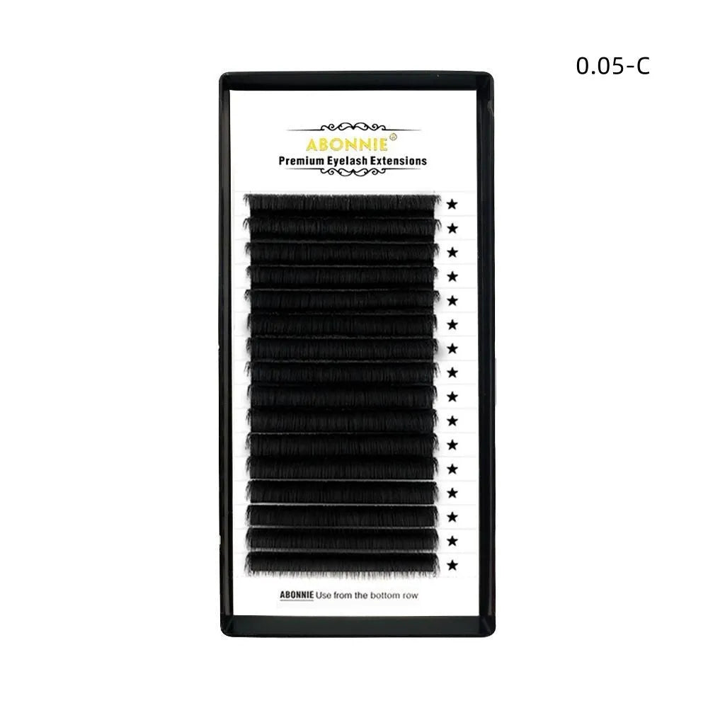 Close-up of dense 16-row false eyelashes with matte wool texture in mink hair, showing length options.