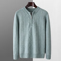 Men's loose grey wool sweater with diamond lattice pattern and half-zip front.