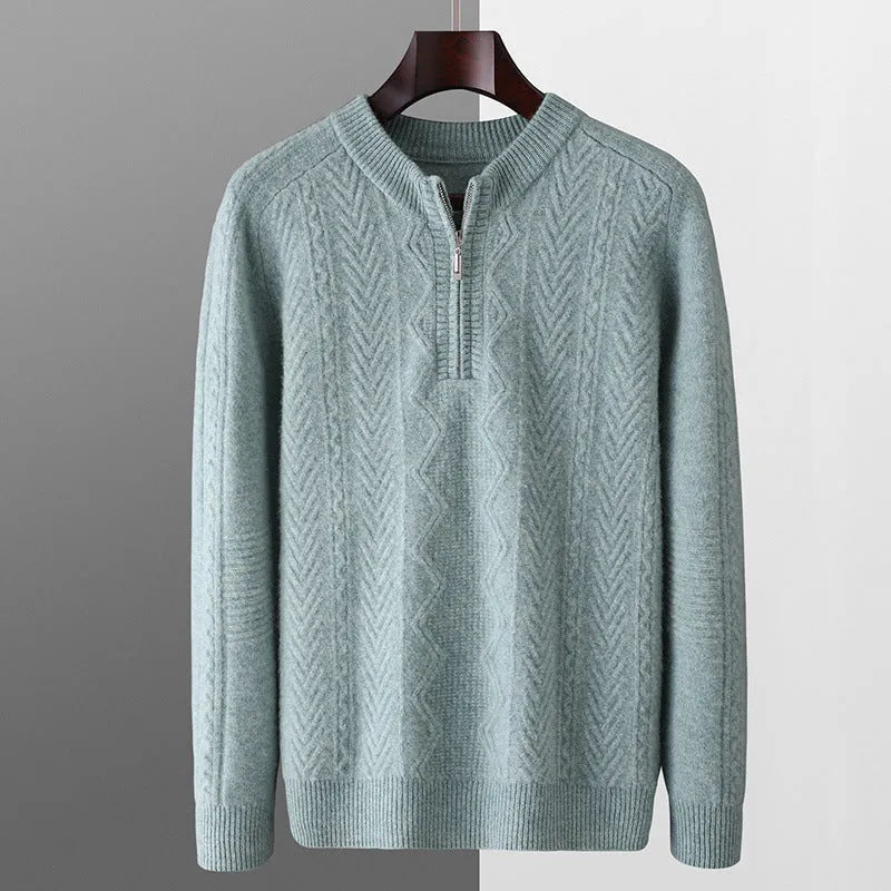 Men's loose grey wool sweater with diamond lattice pattern and half-zip front.