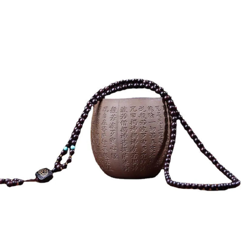 DIY kit showing 108 small 0.6 cm Zambia Rosewood beads for making a flat lotus pendant Buddha bead bracelet.