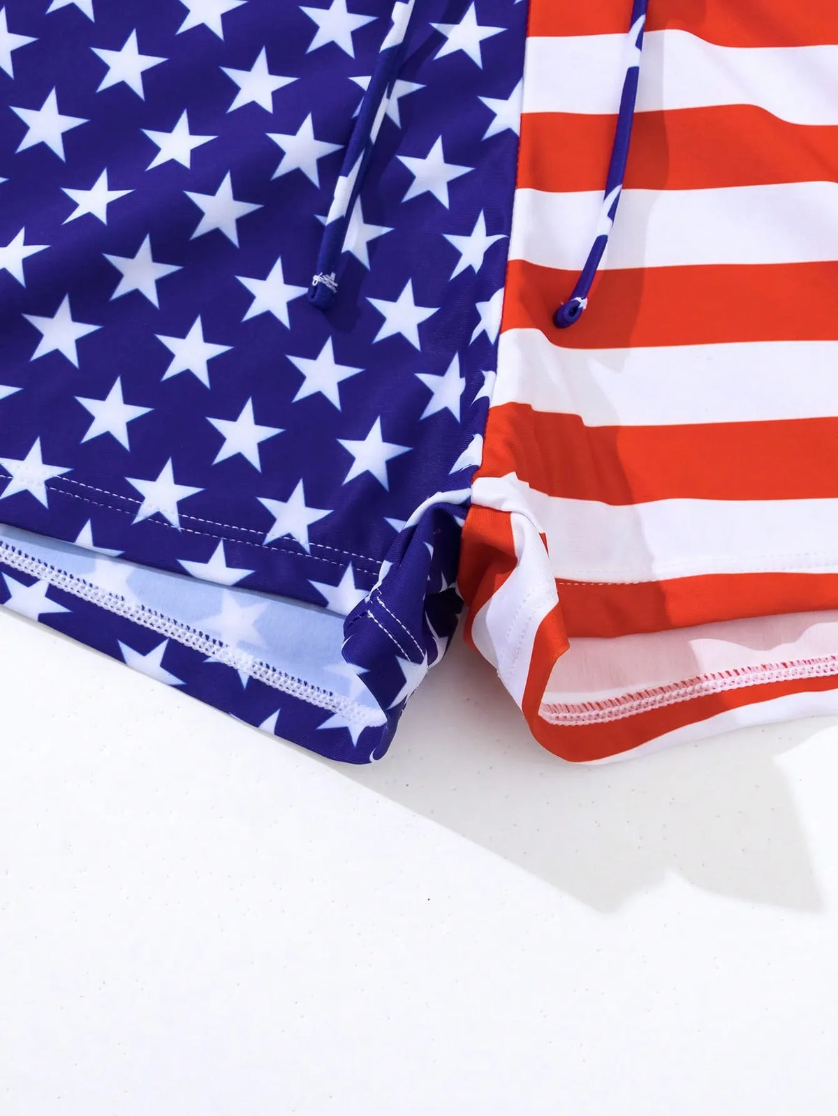 Women's high waist swimsuit with stars and stripes pattern, featuring a drawstring waist and boxer-style briefs