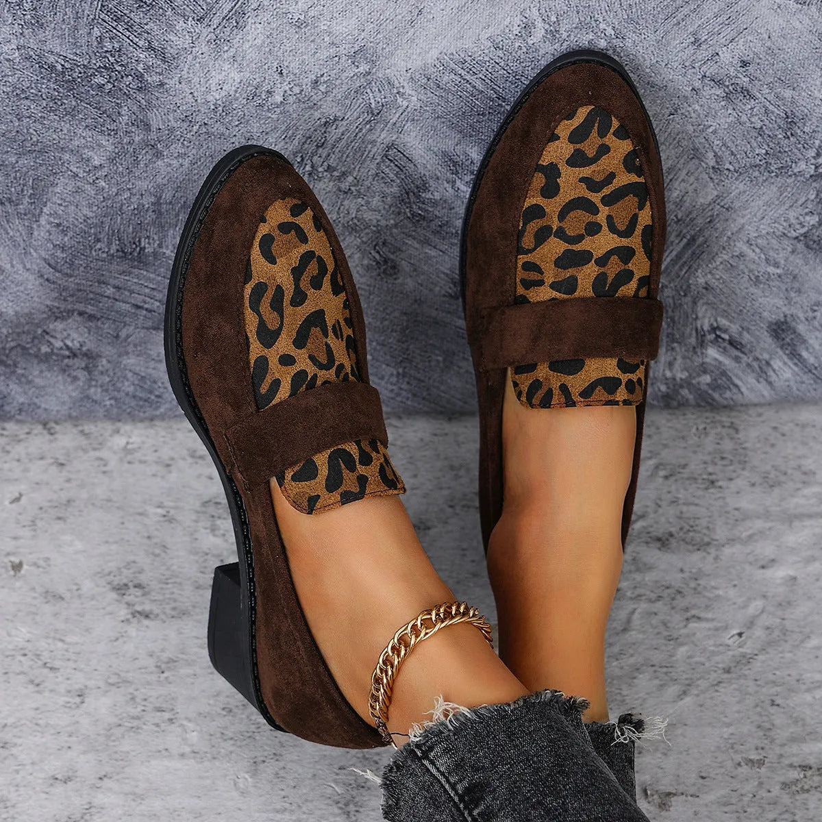 Leopard print suede slip-on shoe with a chunky mid-heel and pointed toe in pink