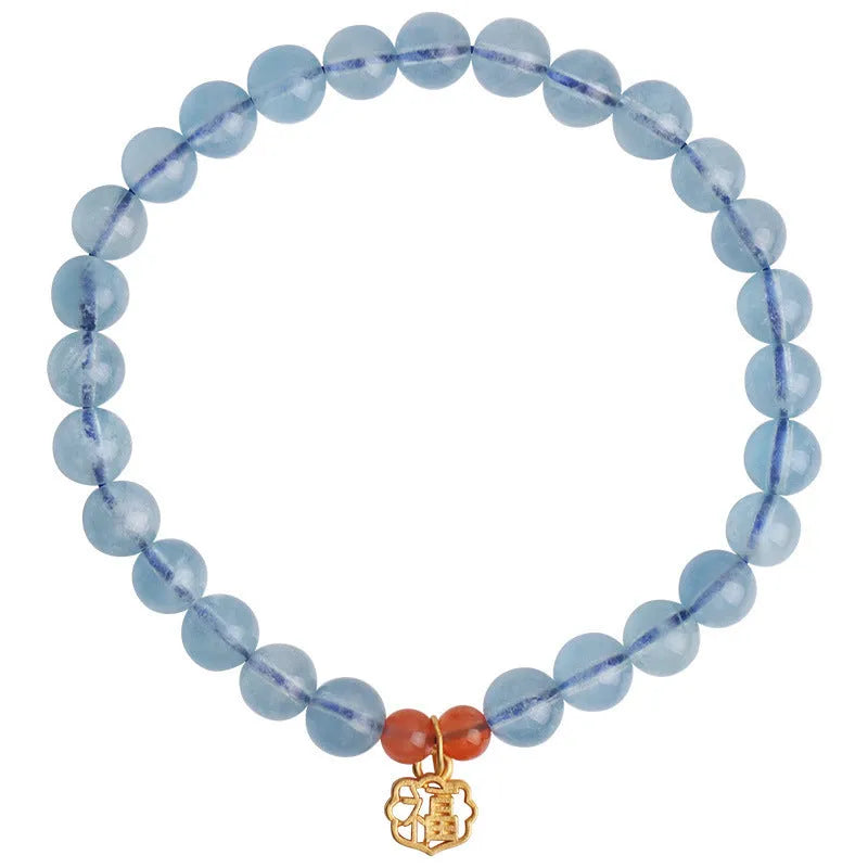 Ice translucent aquamarine crystal bracelet with 8mm round beads and sequin elements