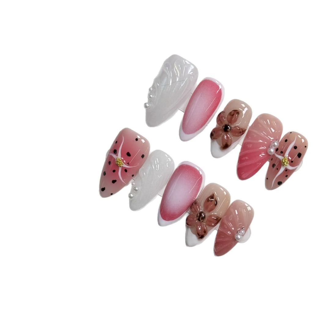 Hand-painted three-dimensional nail art patches with embossed candy patterns in almond shapes
