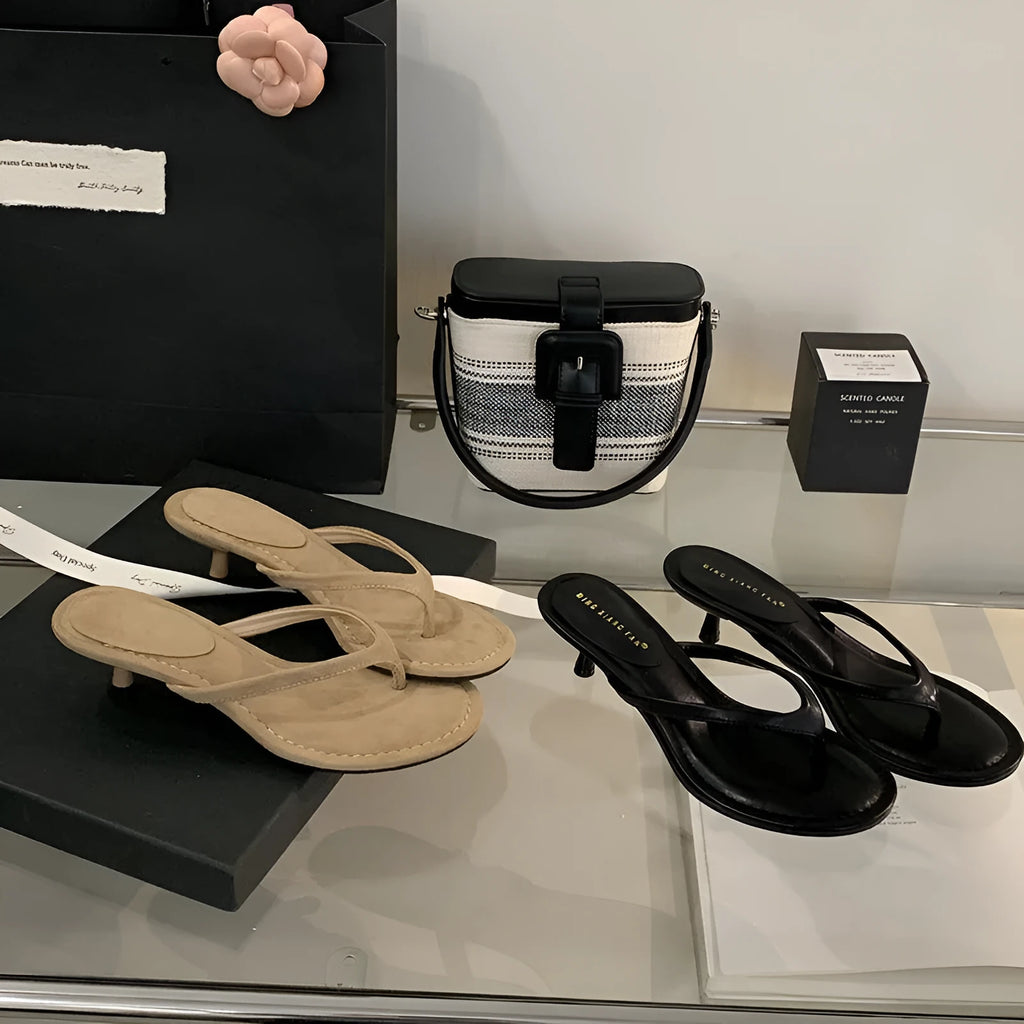 Women's round toe stiletto flip-flop sandals in black and camel colours showing open-toed design