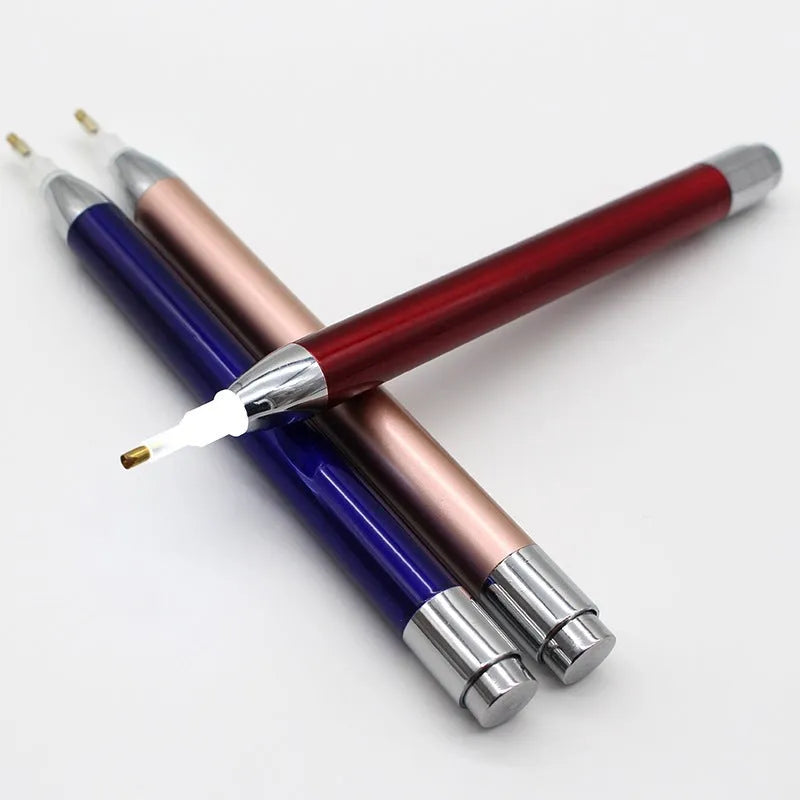 Aluminium alloy luminous single-head diamond painting drill pen in blue, gold, or red colours.