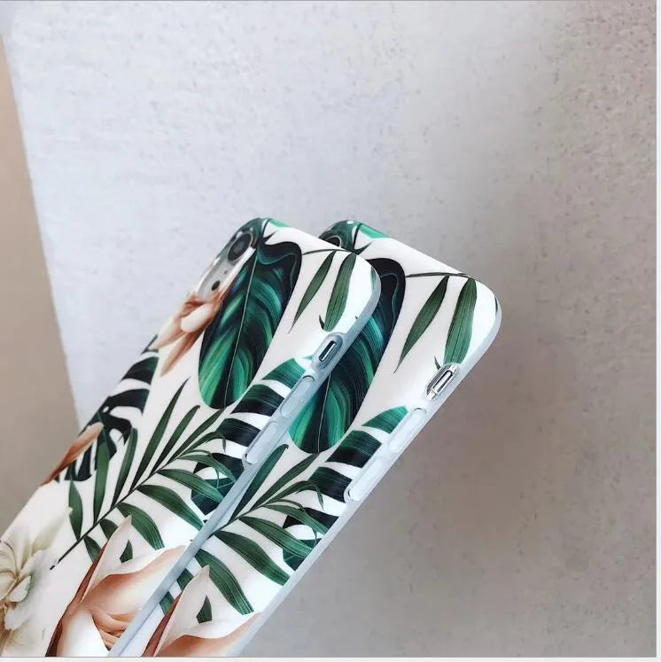 Green banana leaf and floral pattern on a soft TPU iPhone case for models like XS Max and XR.