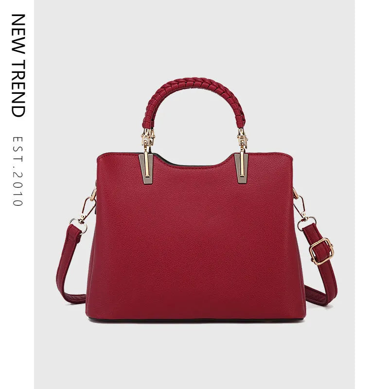 PU ladies handbag 25x12x19cm with single shoulder strap, zip pockets and contrast stitching