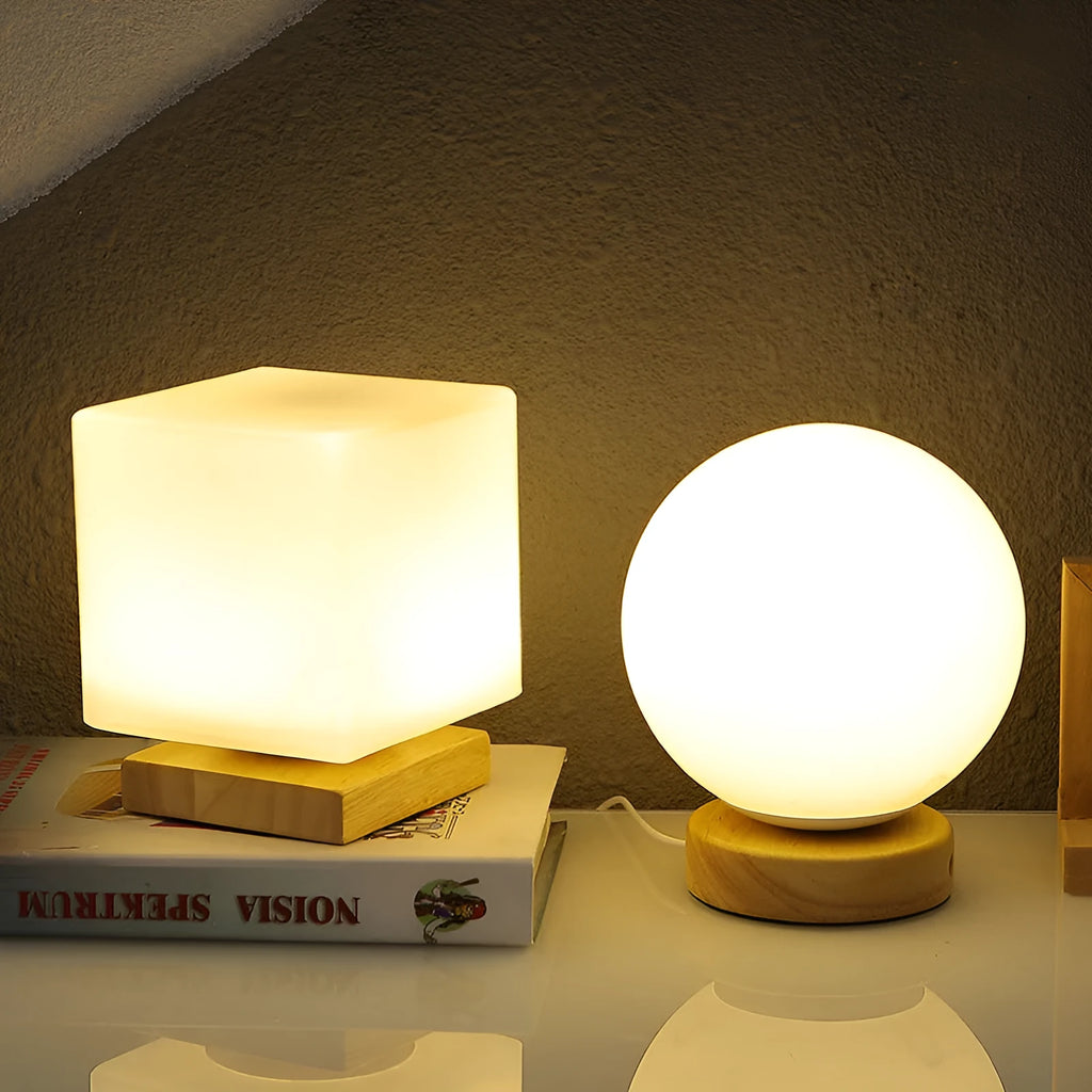Nordic solid wood flower-shaped USB table lamp with touch dimming in a white cube style on a table