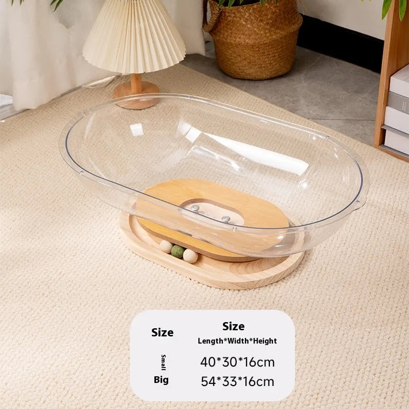 Transparent acrylic cat space capsule bed with turntable base on wooden floor