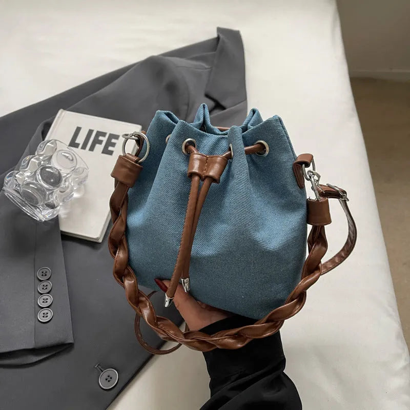 Blue synthetic leather one-shoulder cross body bucket bag with optional hanging ornaments
