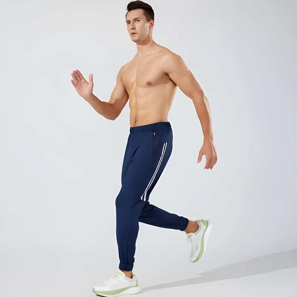 Men's black and navy blue polyester running exercise pants with a mid-waist.