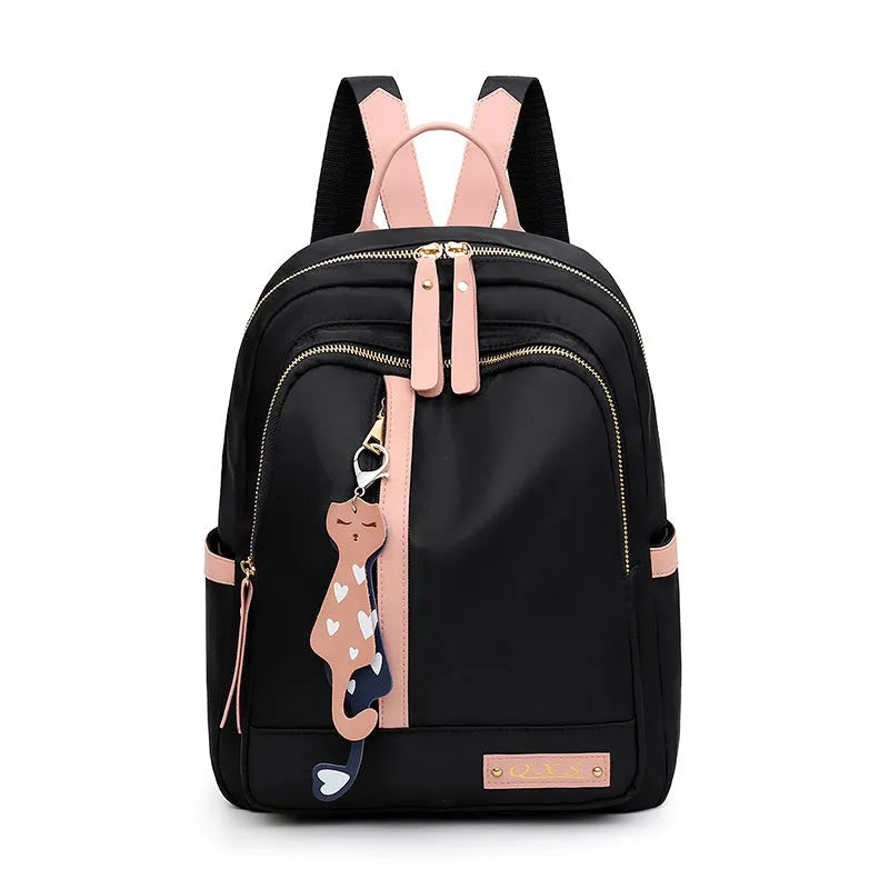 Men's black casual backpack showing multiple compartments and shoulder straps