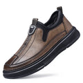 Men's black leather casual shoes with round toe design on solid colour background