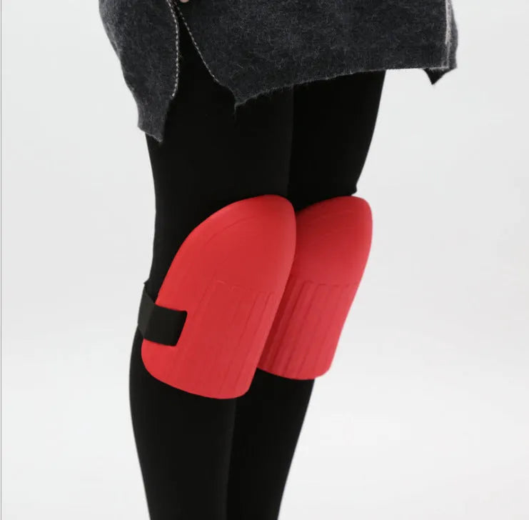 A pair of thick EVA foam knee pads in army green colour, shown on a grey background.