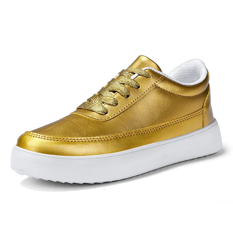 Women's white leather flat lace-up shoes on a solid background.