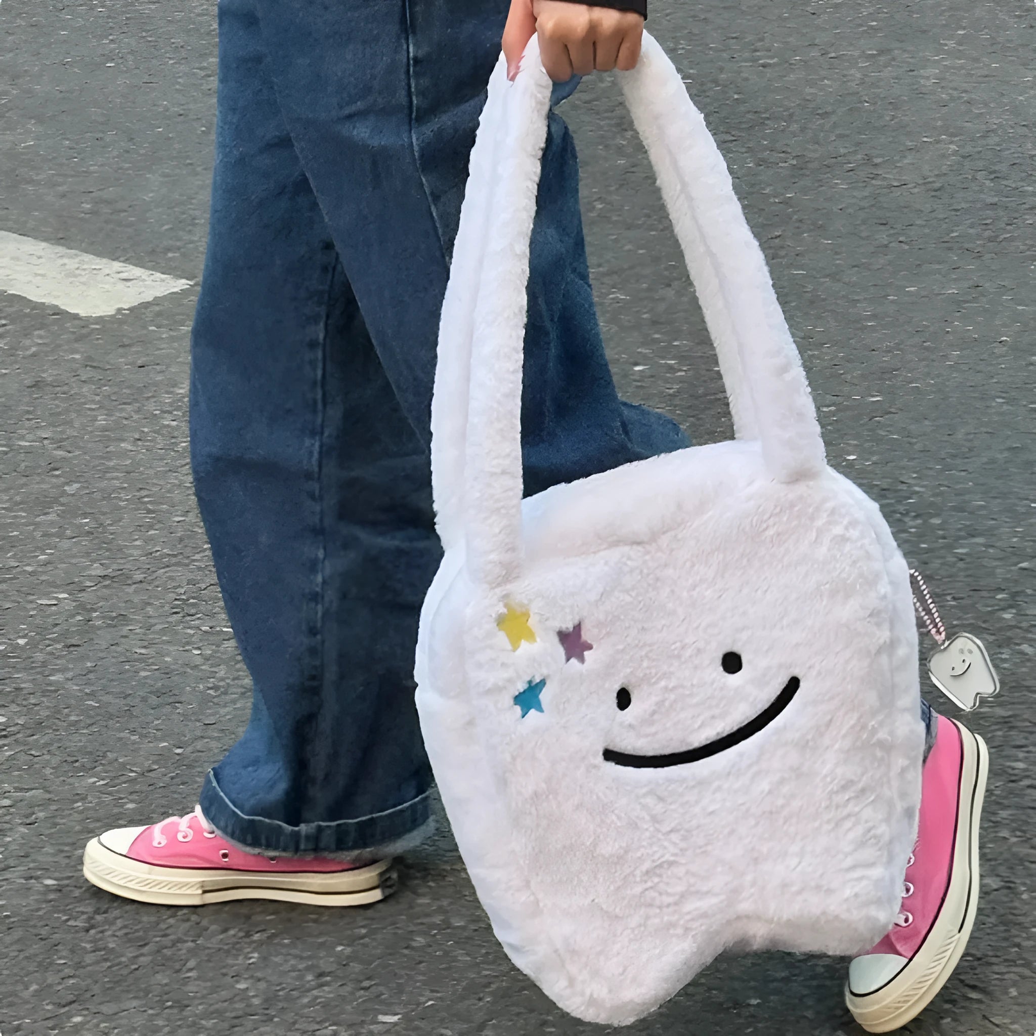 White plush shoulder tote bag with large tooth design and crossbody strap