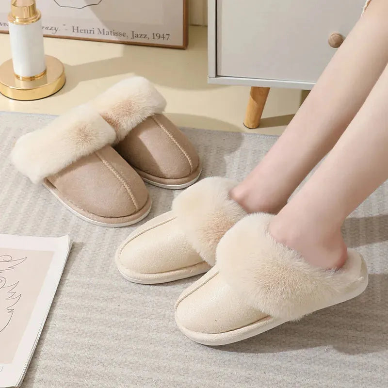 Pair of plush-lined indoor slippers with a flat PVC anti-slip sole, shown in a choice of colours.
