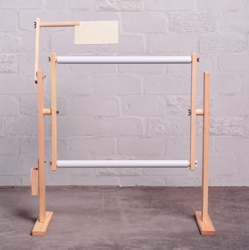 Vertical pine wood embroidery stand with height adjustment on desktop