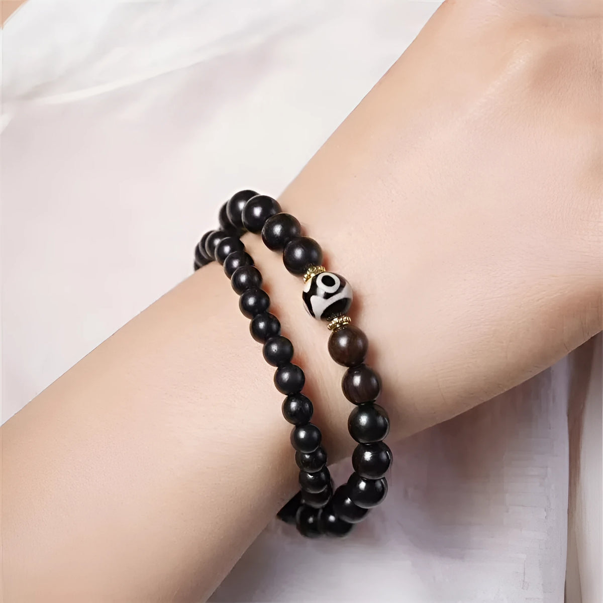 Ebony Tibetan bead bracelet with two circles of 8mm dark wood beads