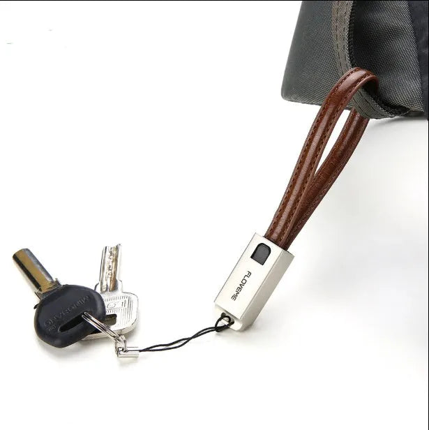 Short 20cm leather braided iPhone charging cable with zinc alloy lightning connector, shown in red colour.