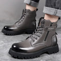 Men's light brown Martin boots with side zipper, thick rubber sole, and visible stitching on leather upper