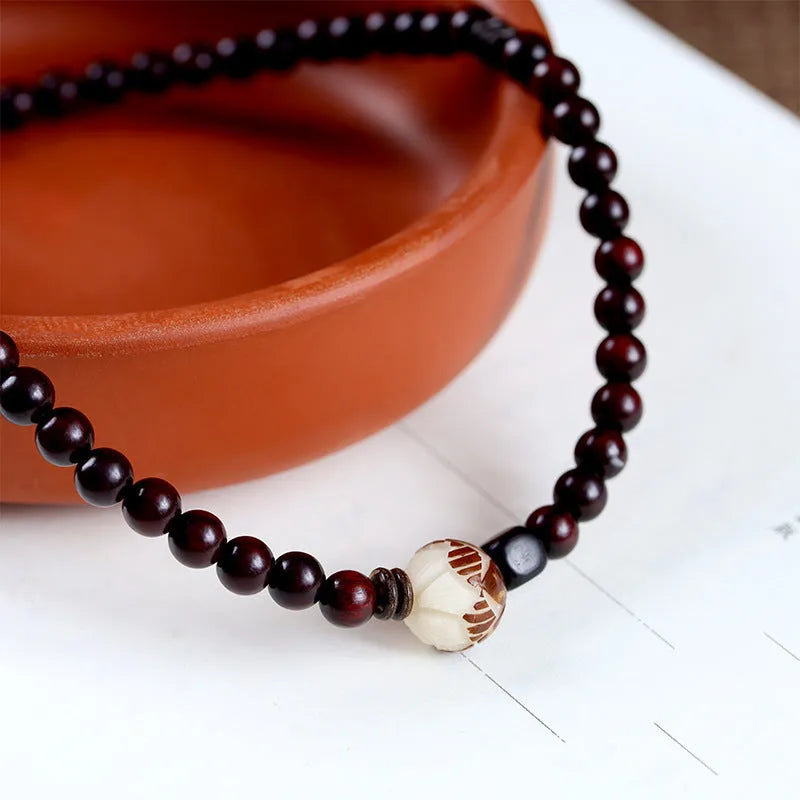 Rosewood double-ring bracelet with floral design measuring 10mm