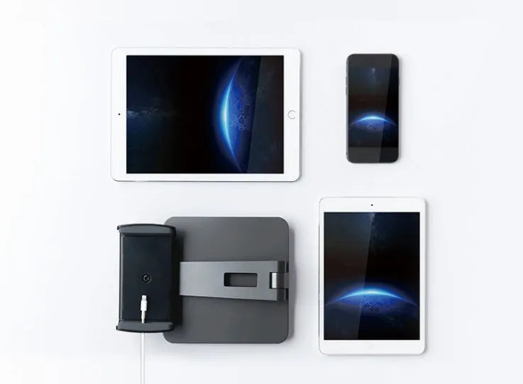 Silver foldable aluminium tablet phone holder showing 360-degree rotation mechanism and silicone anti-slip pads