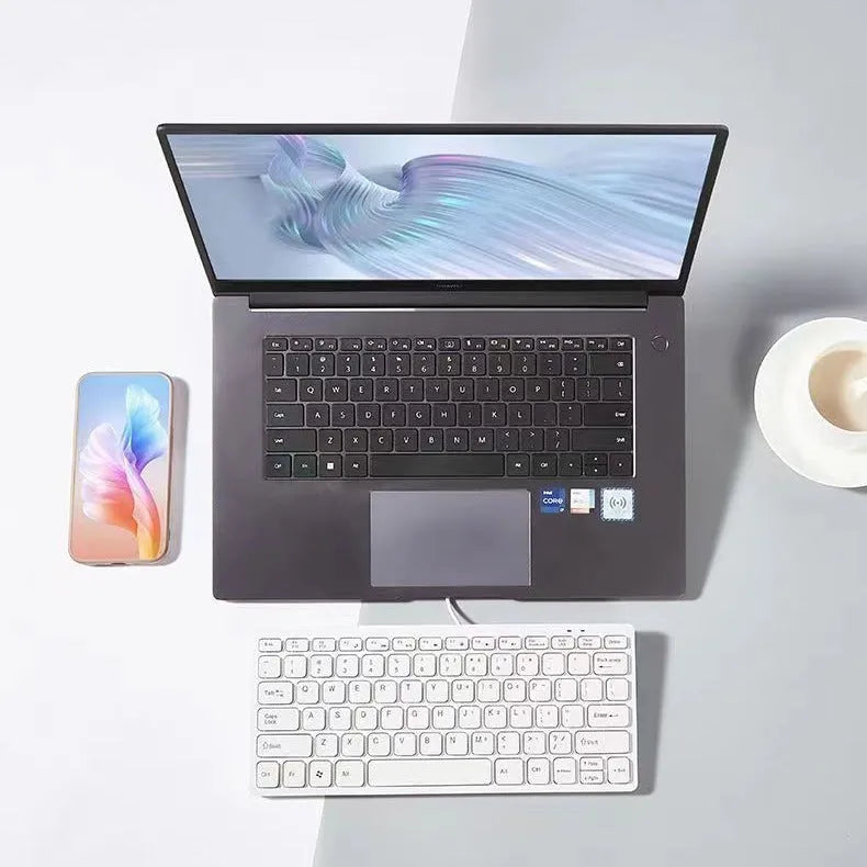 USB wired mini keyboard in black, white, pink, and blue colours with compact design