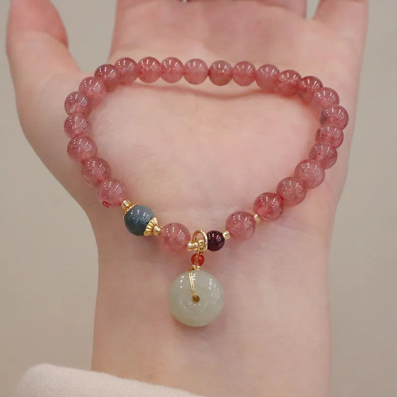 Strawberry quartz bracelet with Chinese purse charm and Hetian jade accents