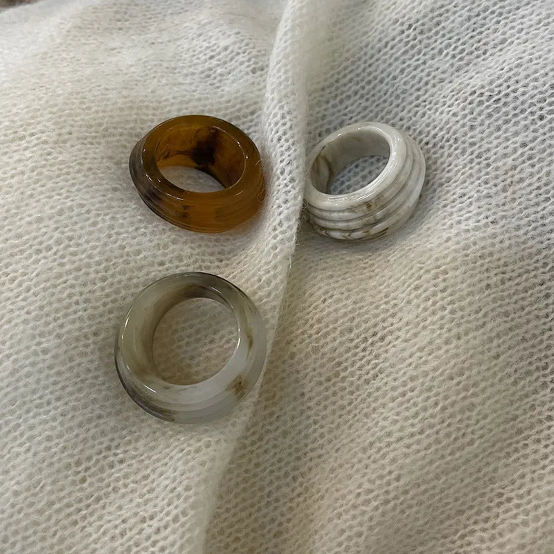 Chinese style irregular geometric resin ring with wide band design in Maillard brown colour