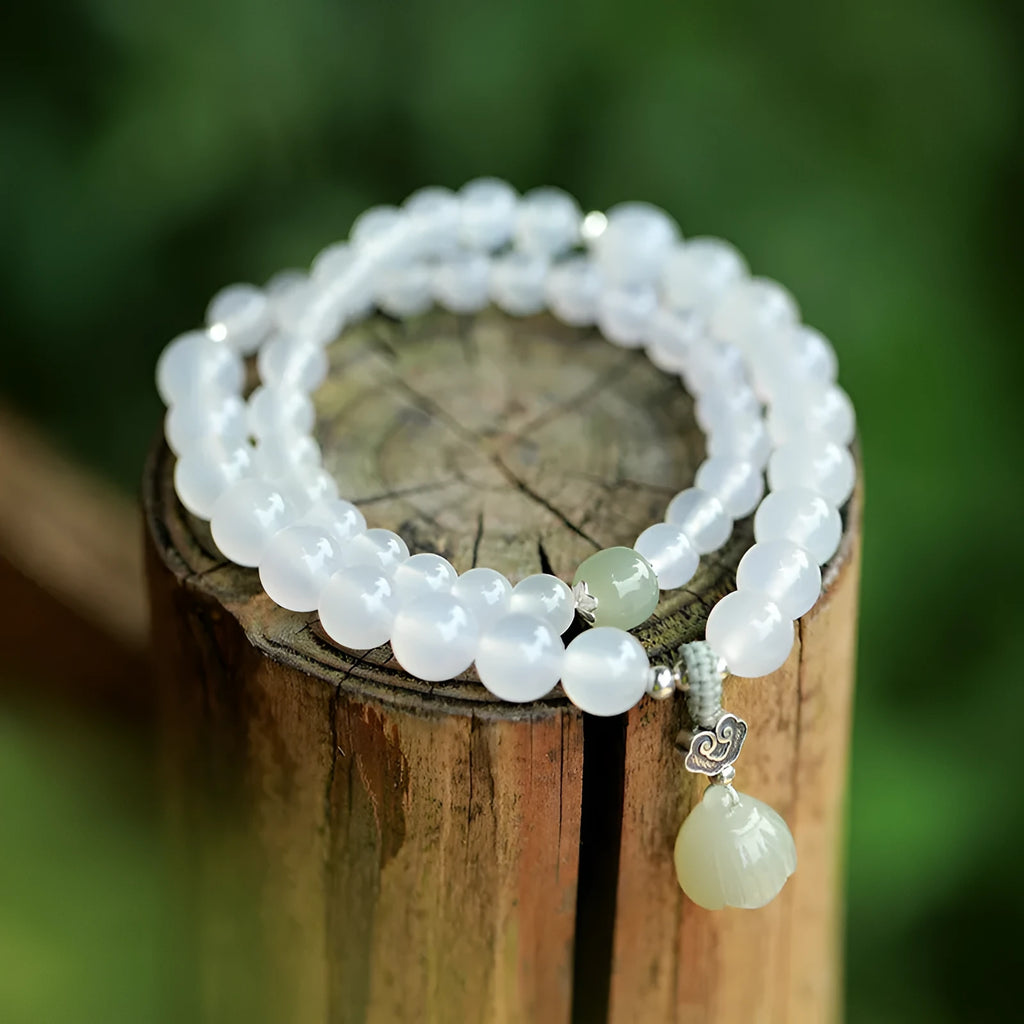 S925 silver bracelet with white agate and Hetian jade stones in geometric lotus design