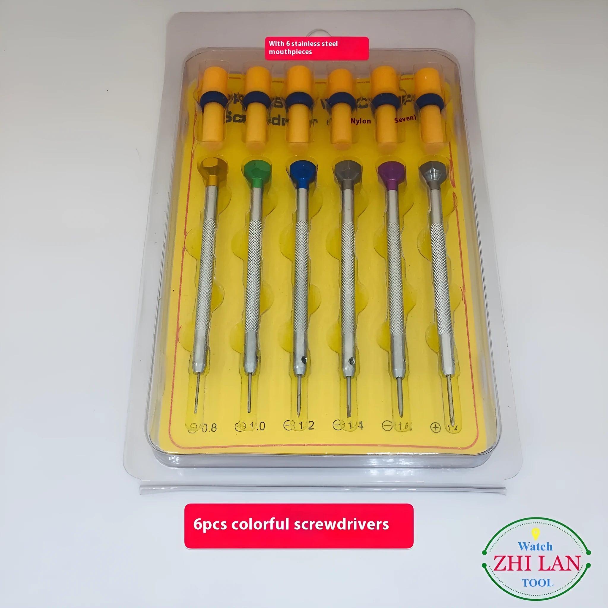 Six colour-coded watch repair screwdrivers with aluminium handles laid out on a surface.