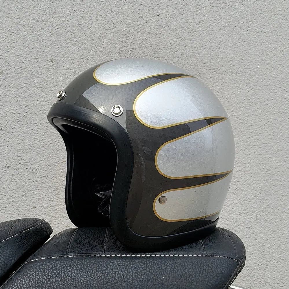 Retro-style half-shell motorcycle helmet in fibreglass, shown in a cement grey colour option.