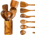 Wooden 7-piece kitchen utensil set showing spoons, spatulas and soup spoons