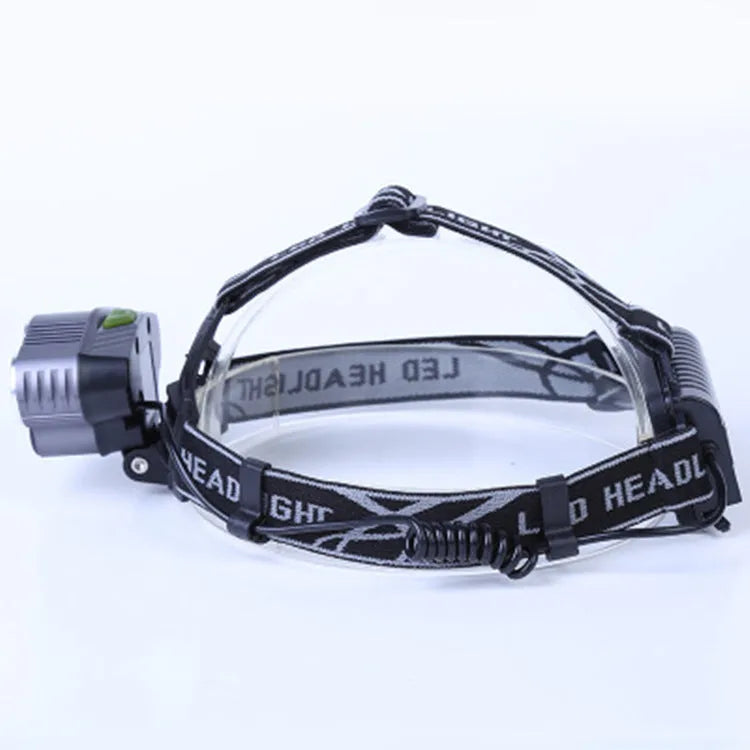 LED head torch with headband, showing focused beam and waterproof housing for outdoor use.