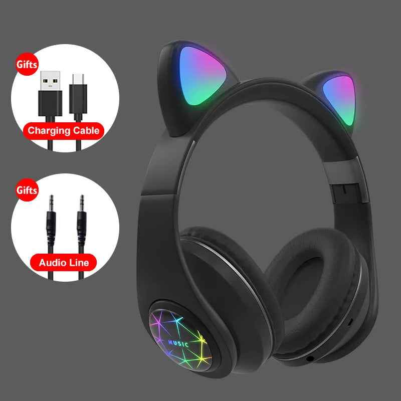 Colourful cat ear style wireless Bluetooth sports headset with a headband, shown in pink.