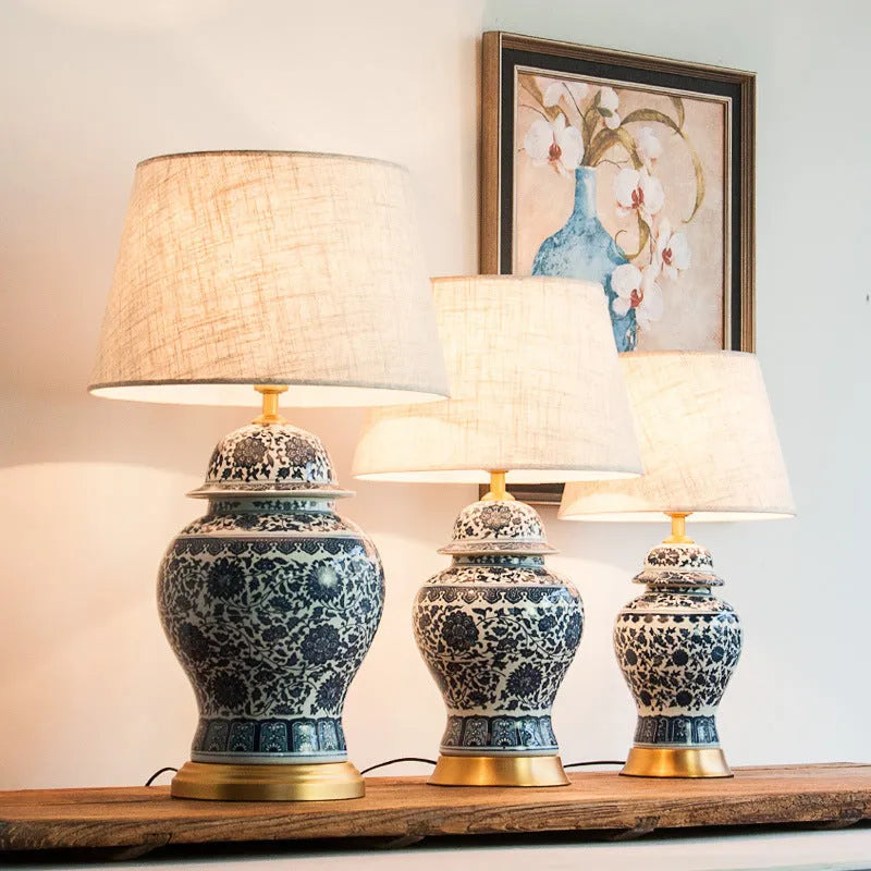 Chinese blue and white porcelain table lamp with ceramic base on bedside table