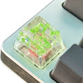 Transparent resin mechanical keyboard keycap with starry sky design in green colour