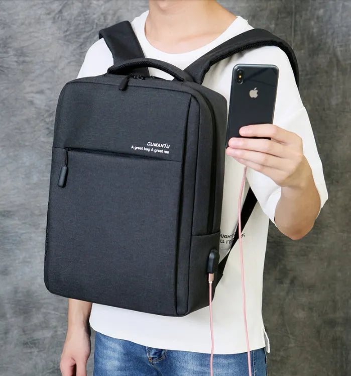 Waterproof Oxford cloth laptop backpack with USB charging port, shown in grey colour