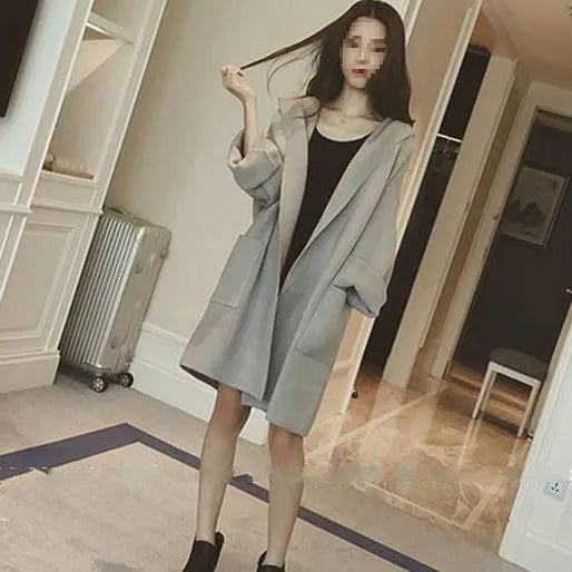 Plus size women's loose fit cotton coat with lace detail in grey, shown on a model.