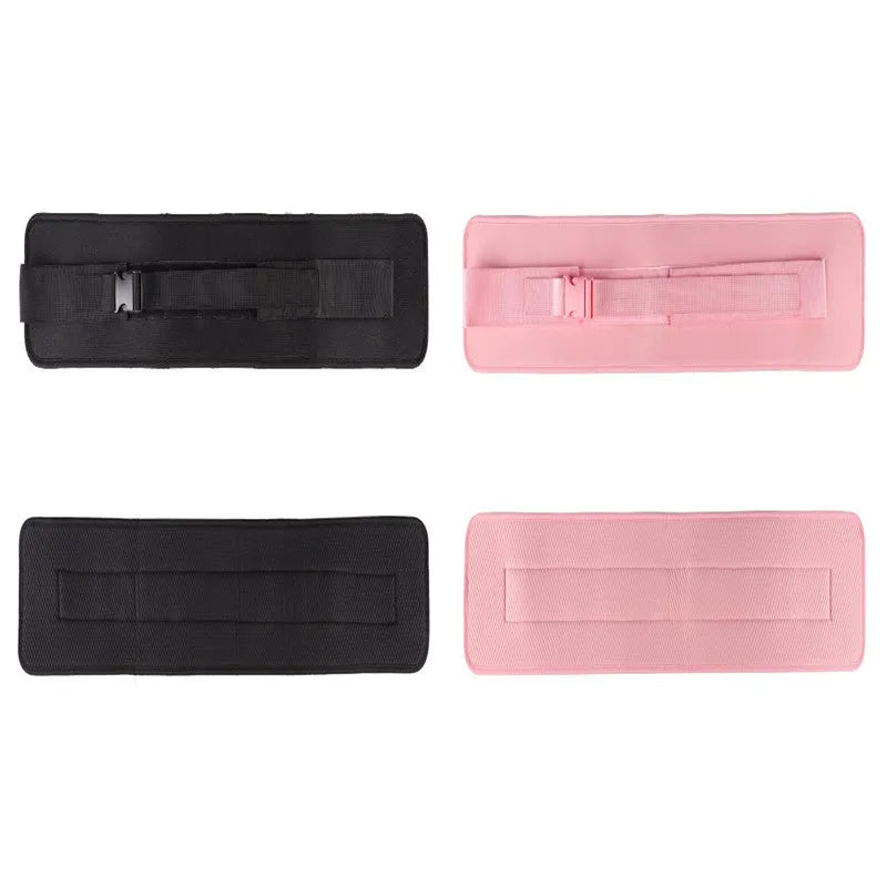 Black fitness training belt with dumbbell strap for hip bridge exercises